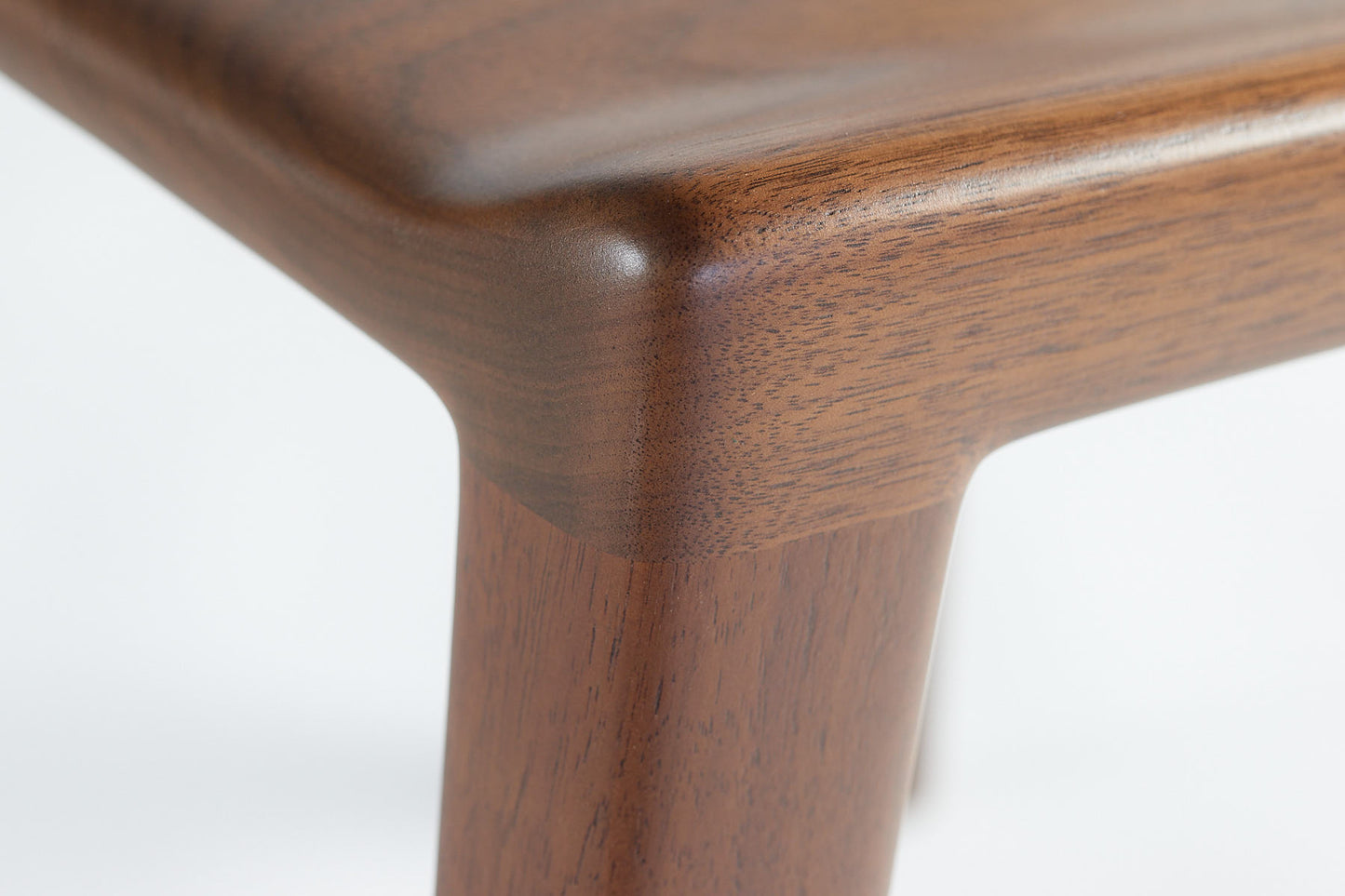 Kompson walnut side chair- front right leg detail