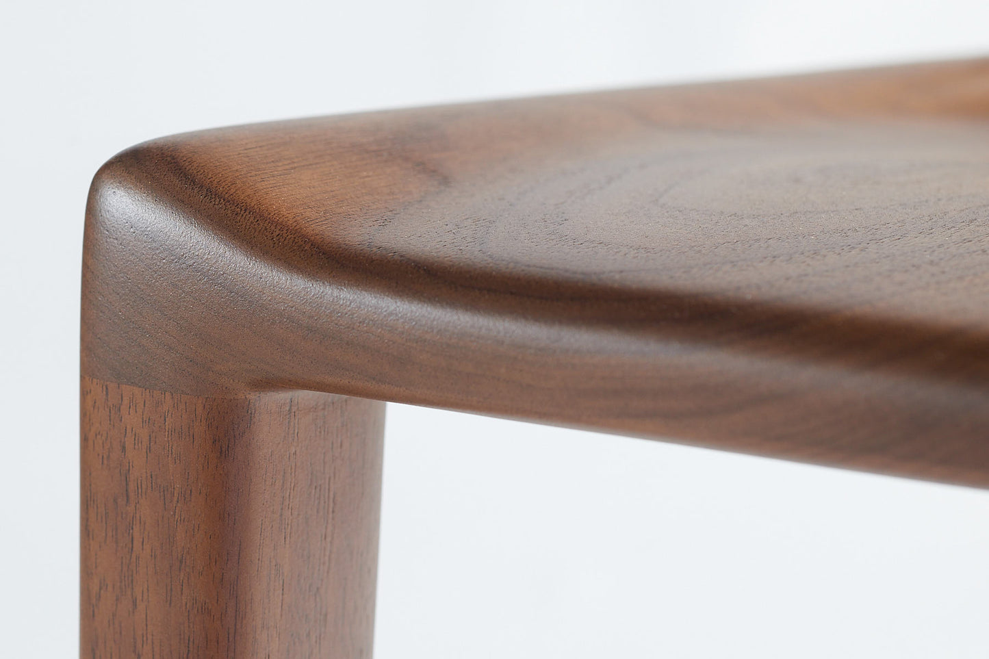 Kompson walnut side chair- left front detail