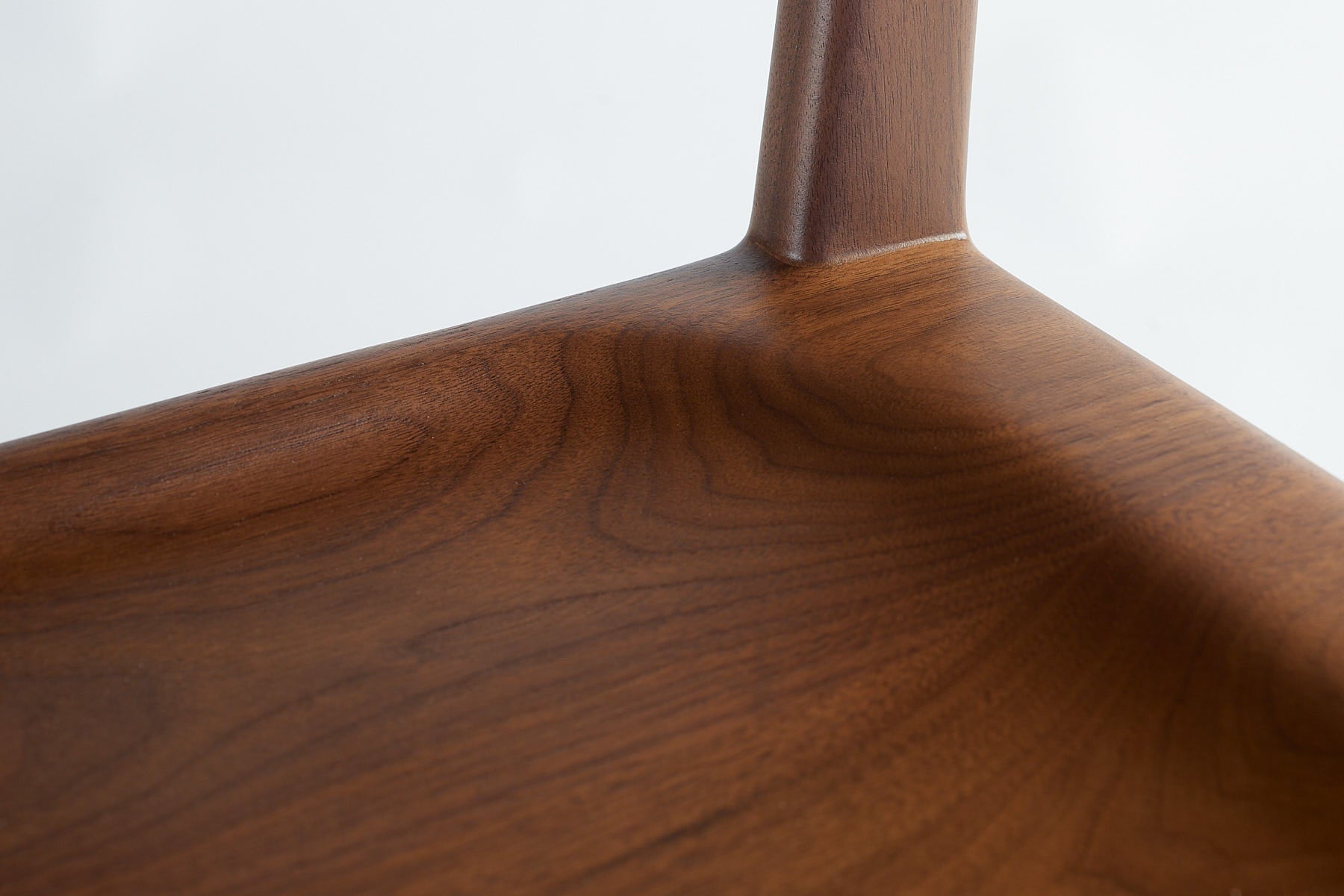 Kompson walnut side chair- right rear leg detail